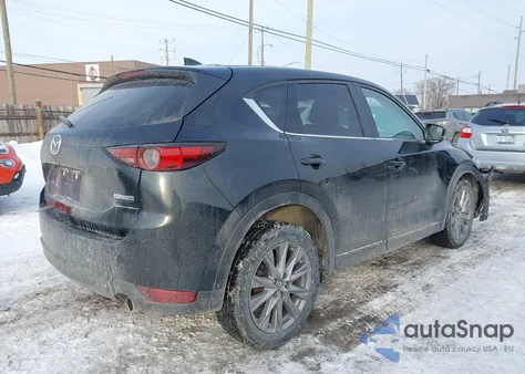 2021 Mazda Cx-5 Grand Touring z USA, uszkodzony, nr VIN JM3KFBDM3M1477254